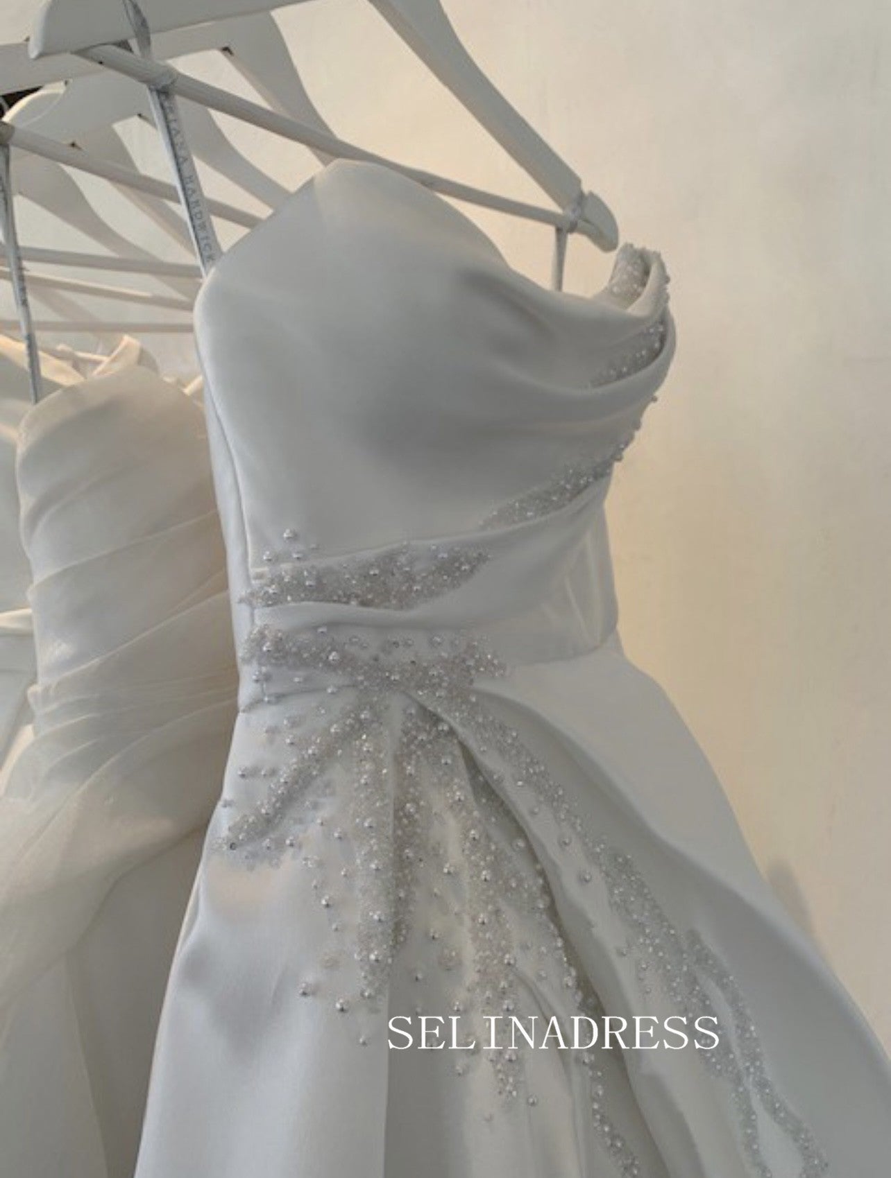 A-line Strapless Satin White Ruffles Wedding Dress Beaded Unique Weddi SELINADRESS A-line Strapless Satin White Ruffles Wedding Dress Beaded Unique Weddi SELINADRESS