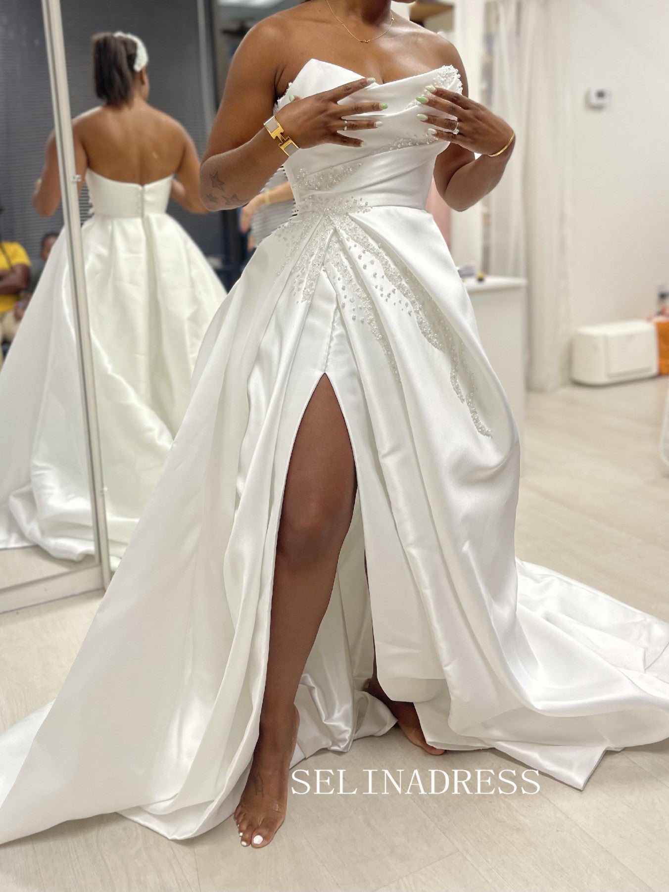 A-line Strapless Satin White Ruffles Wedding Dress Beaded Unique Weddi SELINADRESS A-line Strapless Satin White Ruffles Wedding Dress Beaded Unique Weddi SELINADRESS