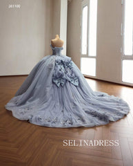 Enchanting Blue Ball Gown with Intricate Floral Embroidery and Dramatic Bow Accents 261120|Selinadress