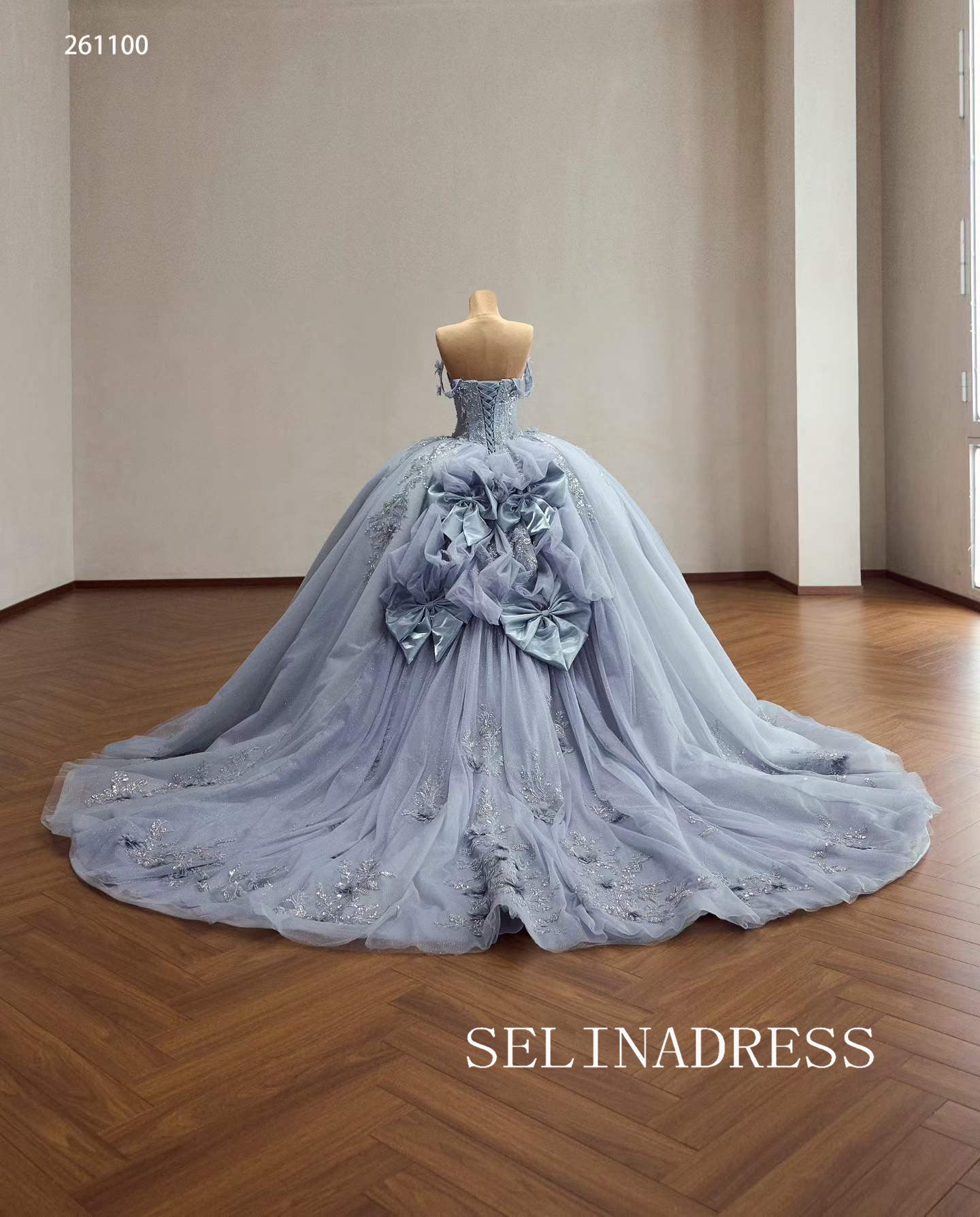 Enchanting Blue Ball Gown with Intricate Floral Embroidery and Dramatic Bow Accents 261120|Selinadress