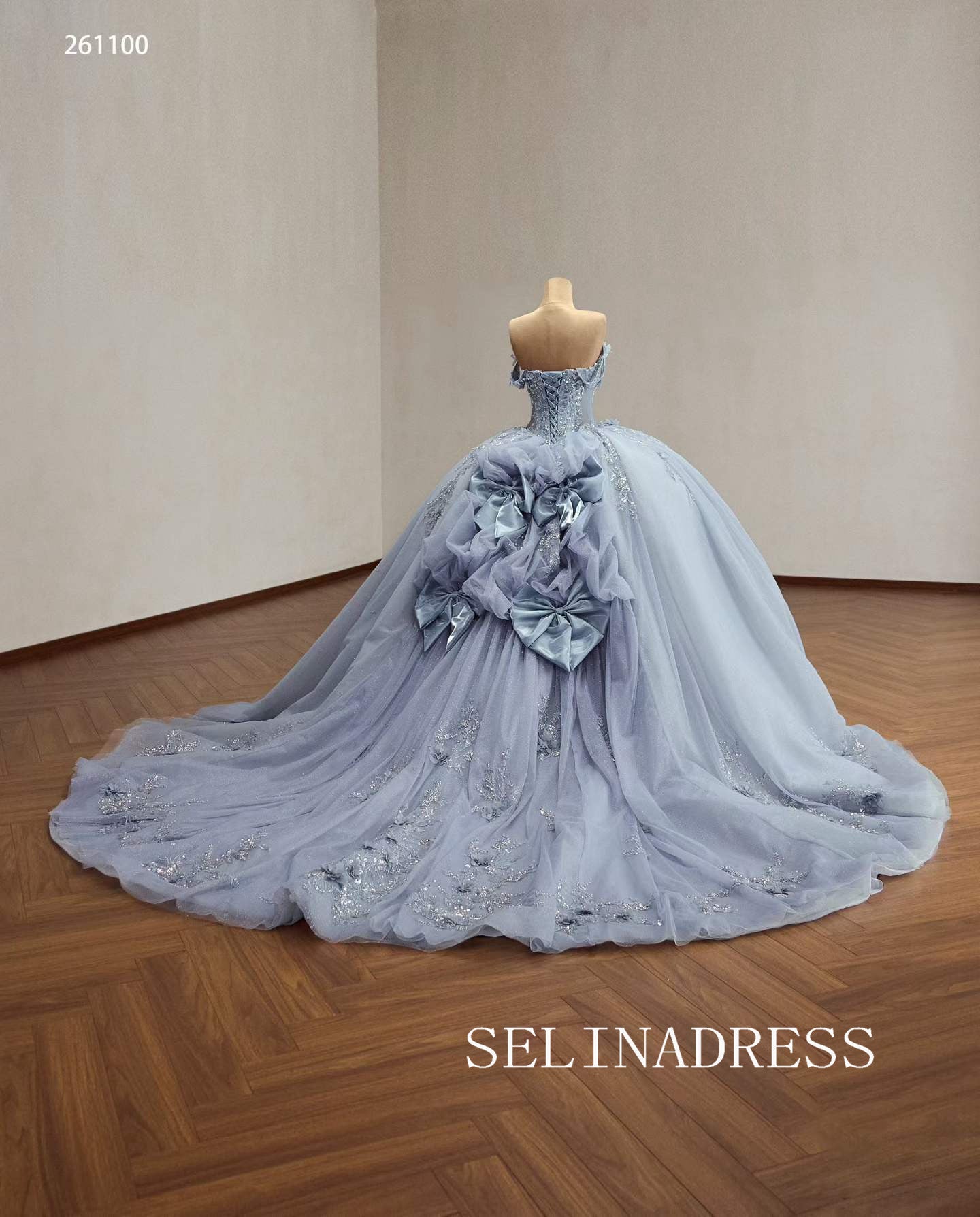 Enchanting Blue Ball Gown with Intricate Floral Embroidery and Dramatic Bow Accents 261120|Selinadress