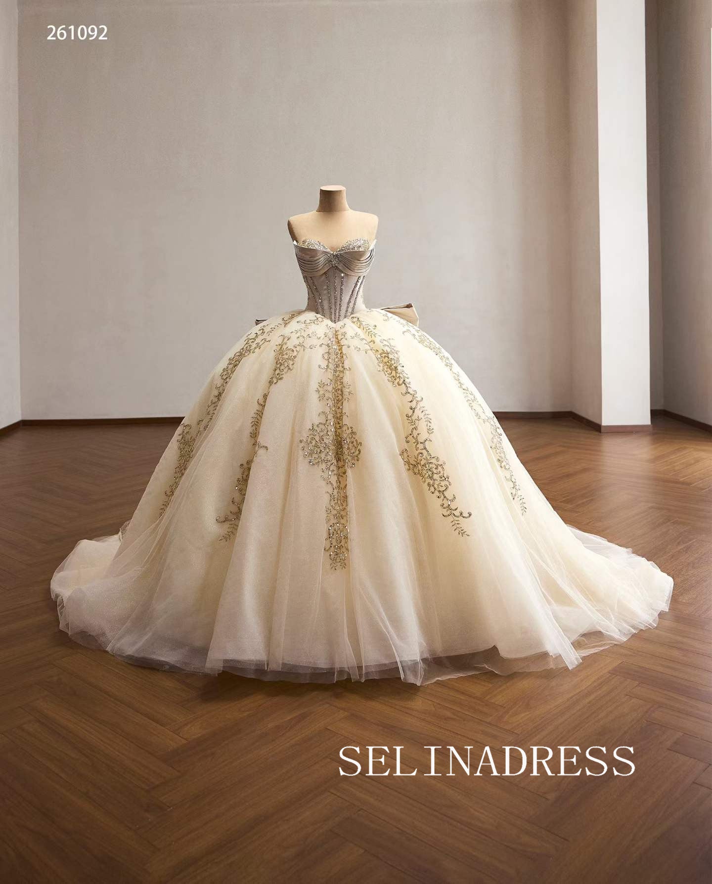 Luxurious Champagne Ball Gown with Intricate Gold Embroidery and Dramatic Bow Back 261092|Selinadress