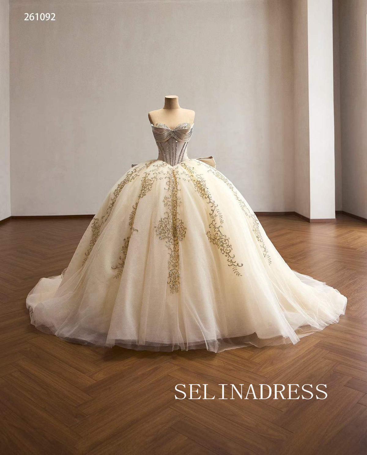 Luxurious Champagne Ball Gown with Intricate Gold Embroidery and Dramatic Bow Back 261092|Selinadress