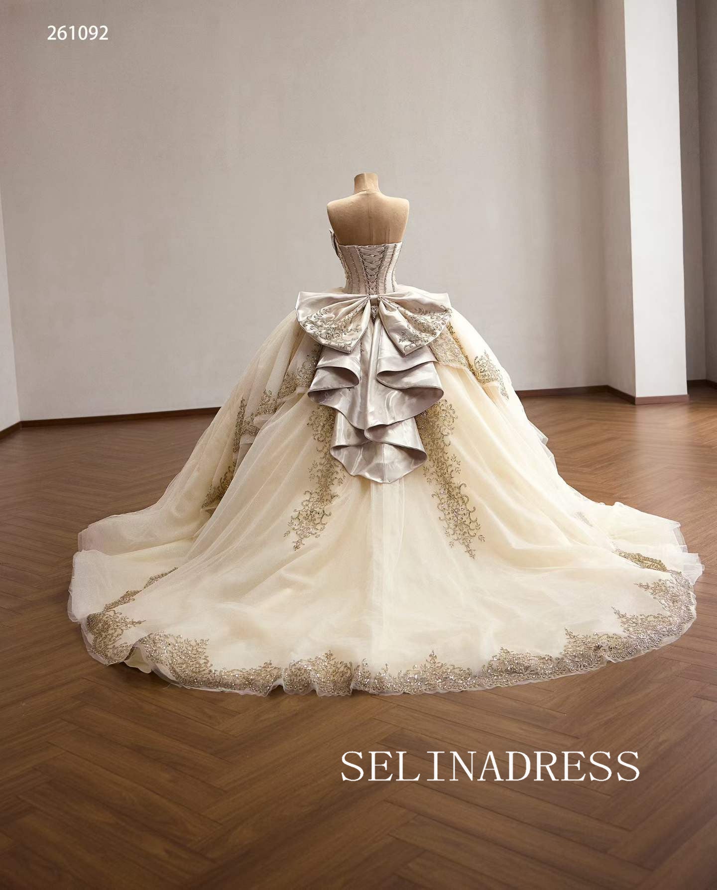 Luxurious Champagne Ball Gown with Intricate Gold Embroidery and Dramatic Bow Back 261092|Selinadress