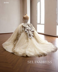 Luxurious Champagne Ball Gown with Intricate Gold Embroidery and Dramatic Bow Back 261092|Selinadress