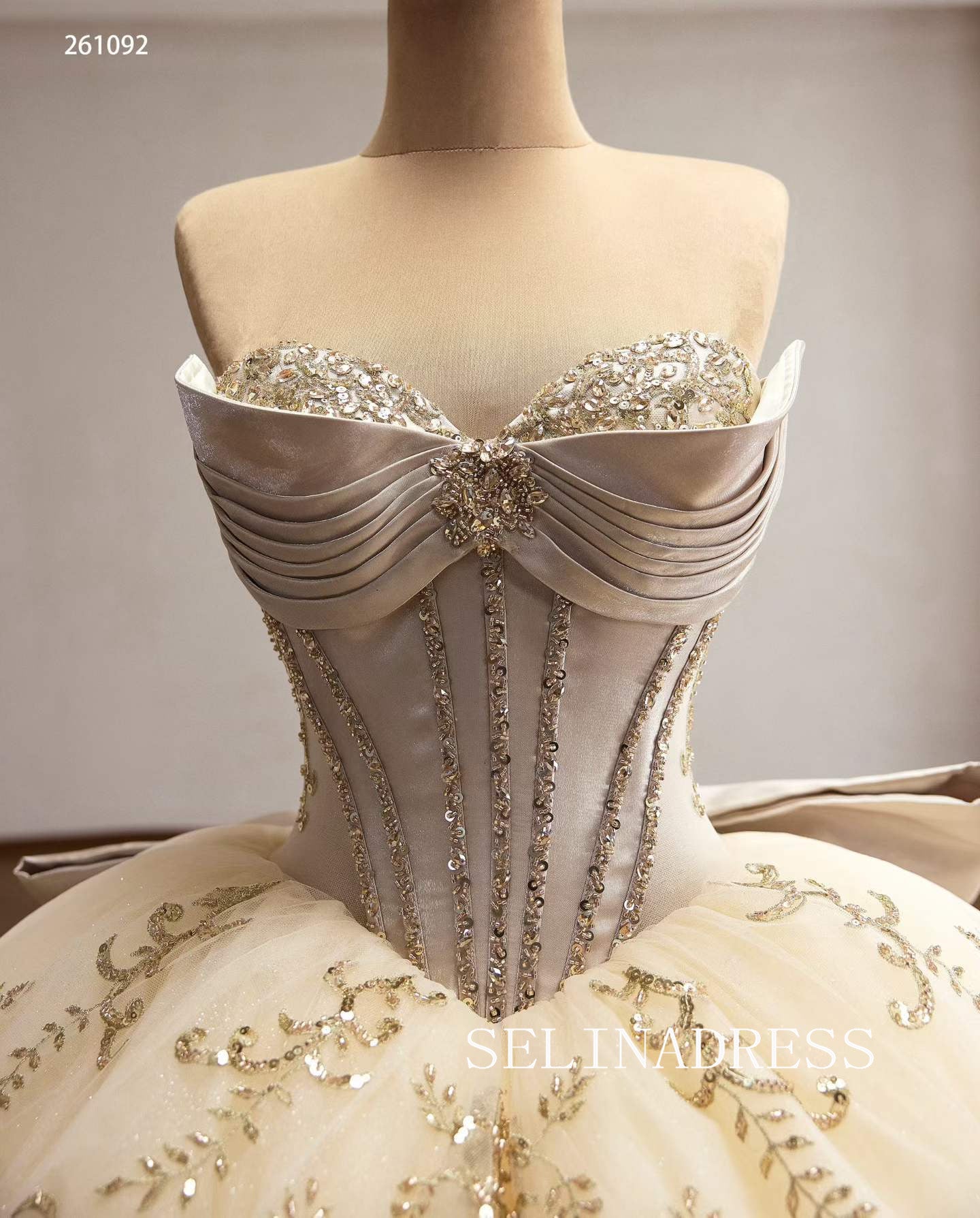 Luxurious Champagne Ball Gown with Intricate Gold Embroidery and Dramatic Bow Back 261092|Selinadress
