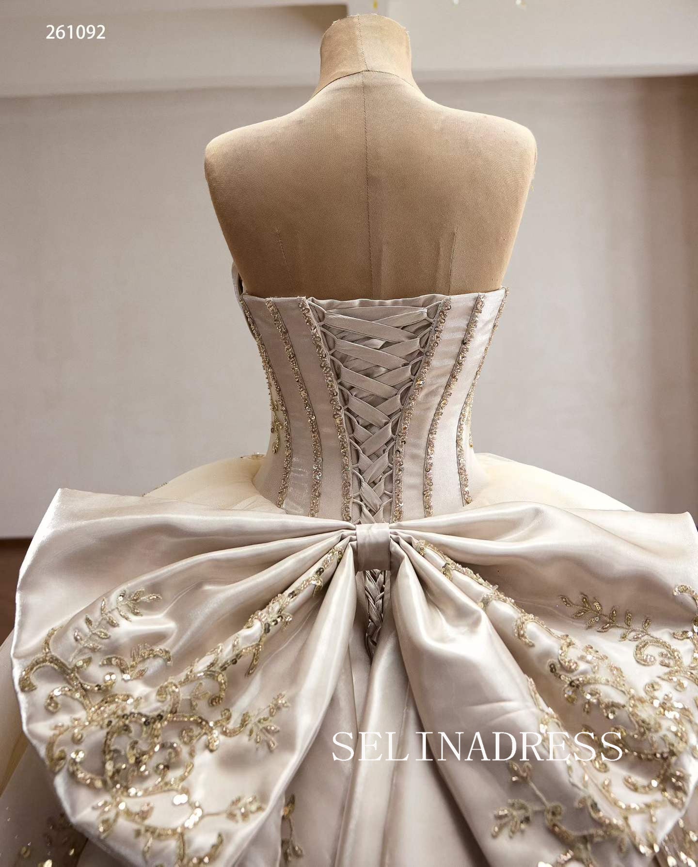 Luxurious Champagne Ball Gown with Intricate Gold Embroidery and Dramatic Bow Back 261092|Selinadress