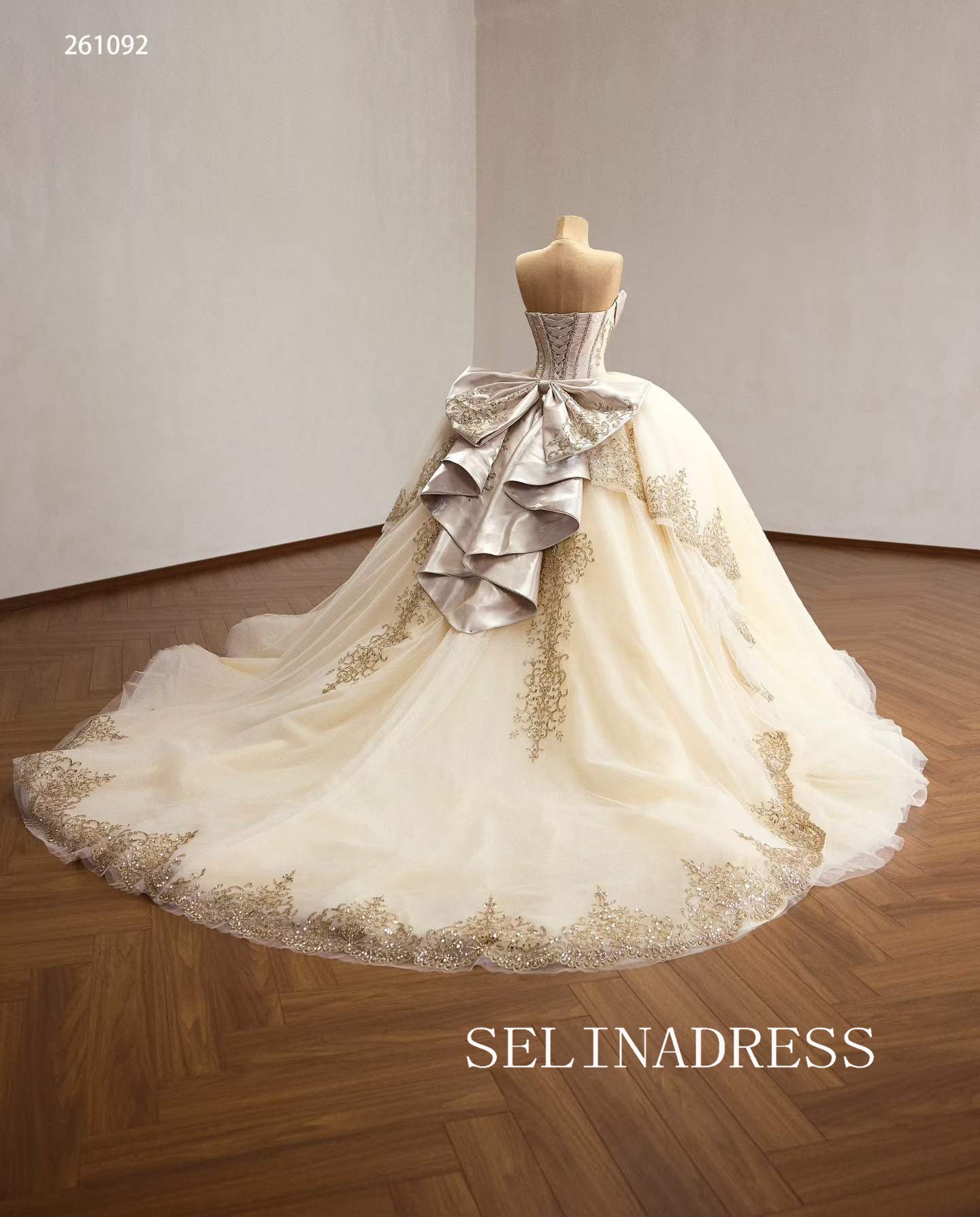 Luxurious Champagne Ball Gown with Intricate Gold Embroidery and Dramatic Bow Back 261092|Selinadress