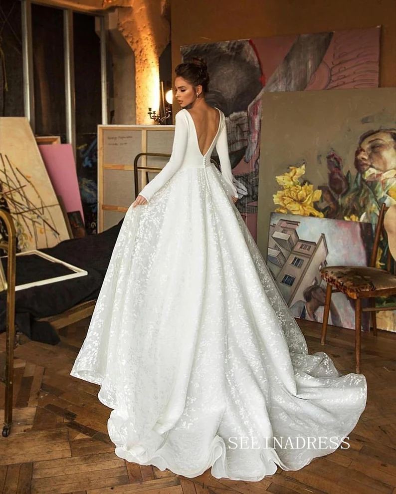 A-line Deep V Neck Long Sleeve Ivory Wedding Dresses Satin Bridal Gown SELINADRESS A-line Deep V Neck Long Sleeve Ivory Wedding Dresses Satin Bridal Gown SELINADRESS