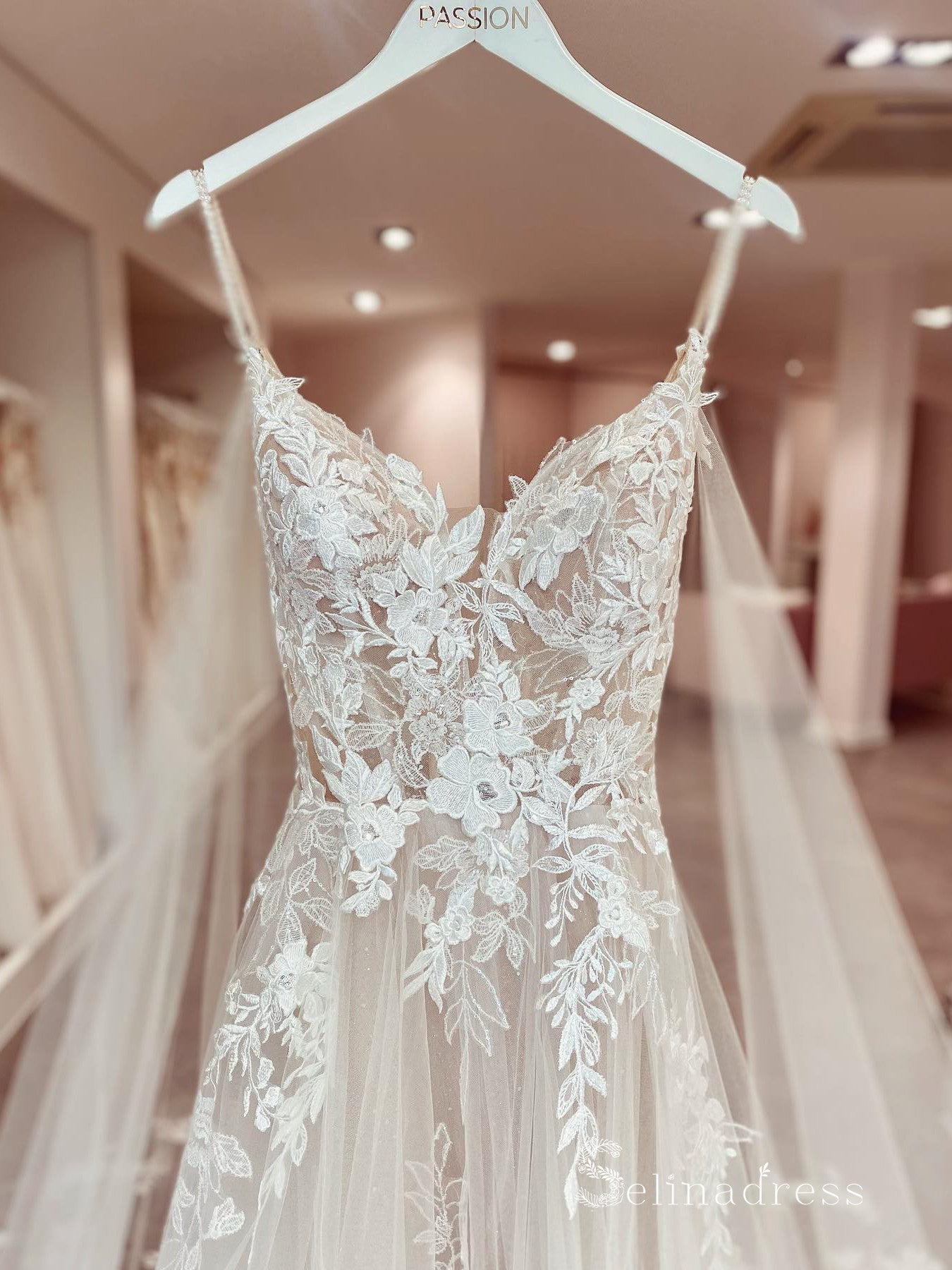 https://www.selinadress.com/cdn/shop/products/a-line-spaghetti-straps-rustic-embroidery-lace-wedding-dresses-country-bridal-gowns-msl2814_1_1024x1024@2x.jpg?v=1635499650